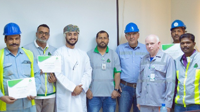 Honoring trainees in the course (working in high places using safety belts) under the supervision of the HSE Department